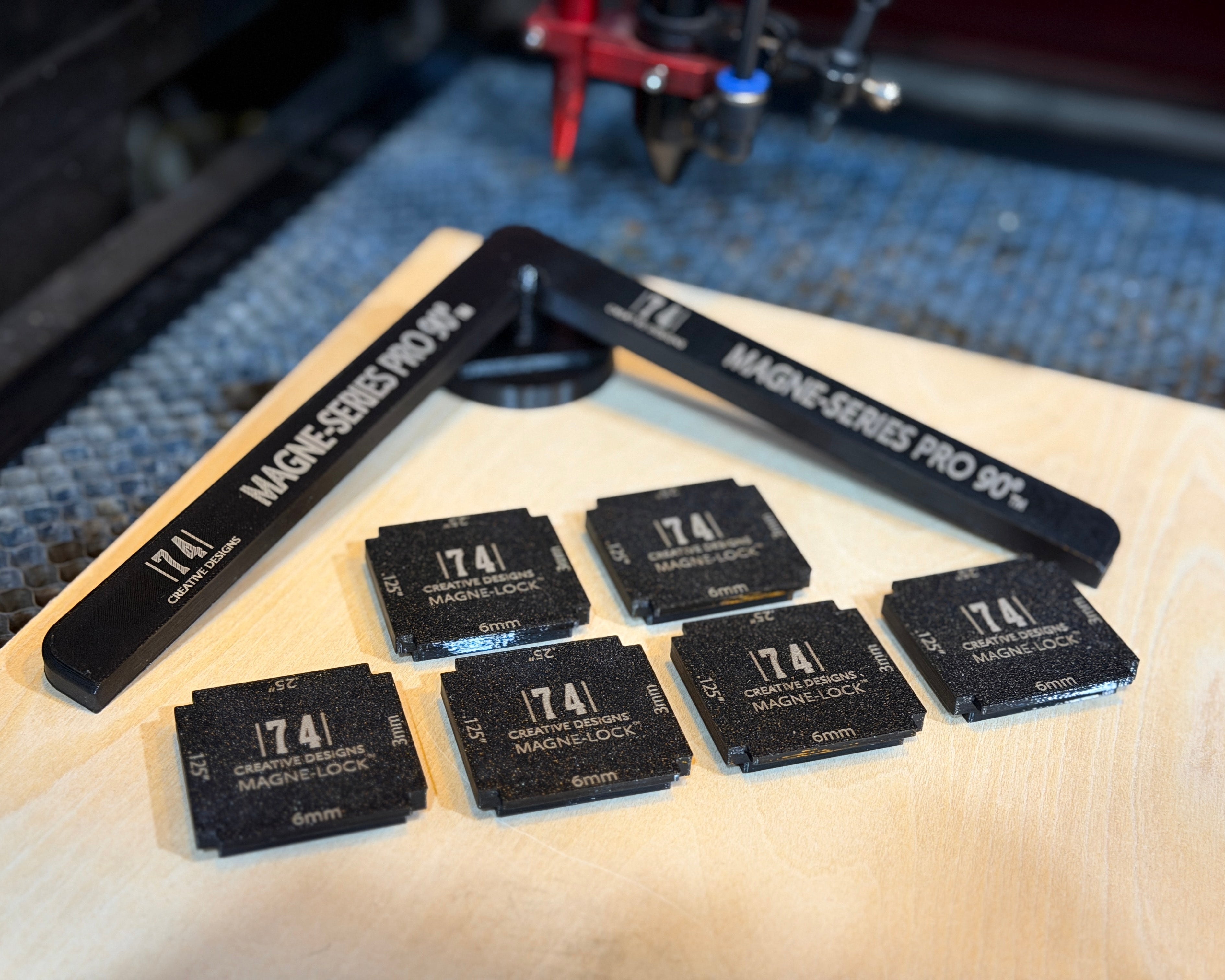 Co2 laser material magnetic hold down
with 90 degree magnetic alignment tool